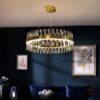 799ceadf-ad2e-4d15-8f74-a10fbc8ee7bd ثريا كريستالية حديثة فاخرة (دائرية) — تصميم ذهبي أنيق