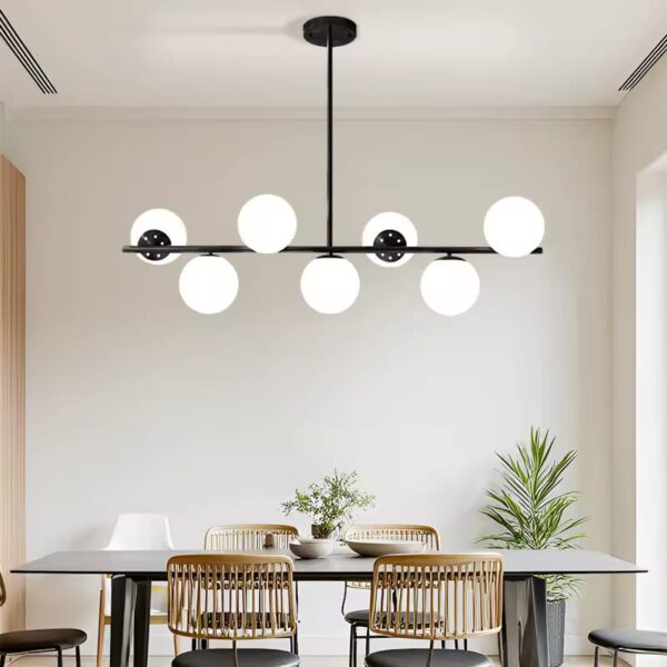 WhatsApp Image 2025-12-03 at 2.31.01 PM ثريا خطية عصرية بـ 7 لمبات (إطار أسود أو ذهبي)